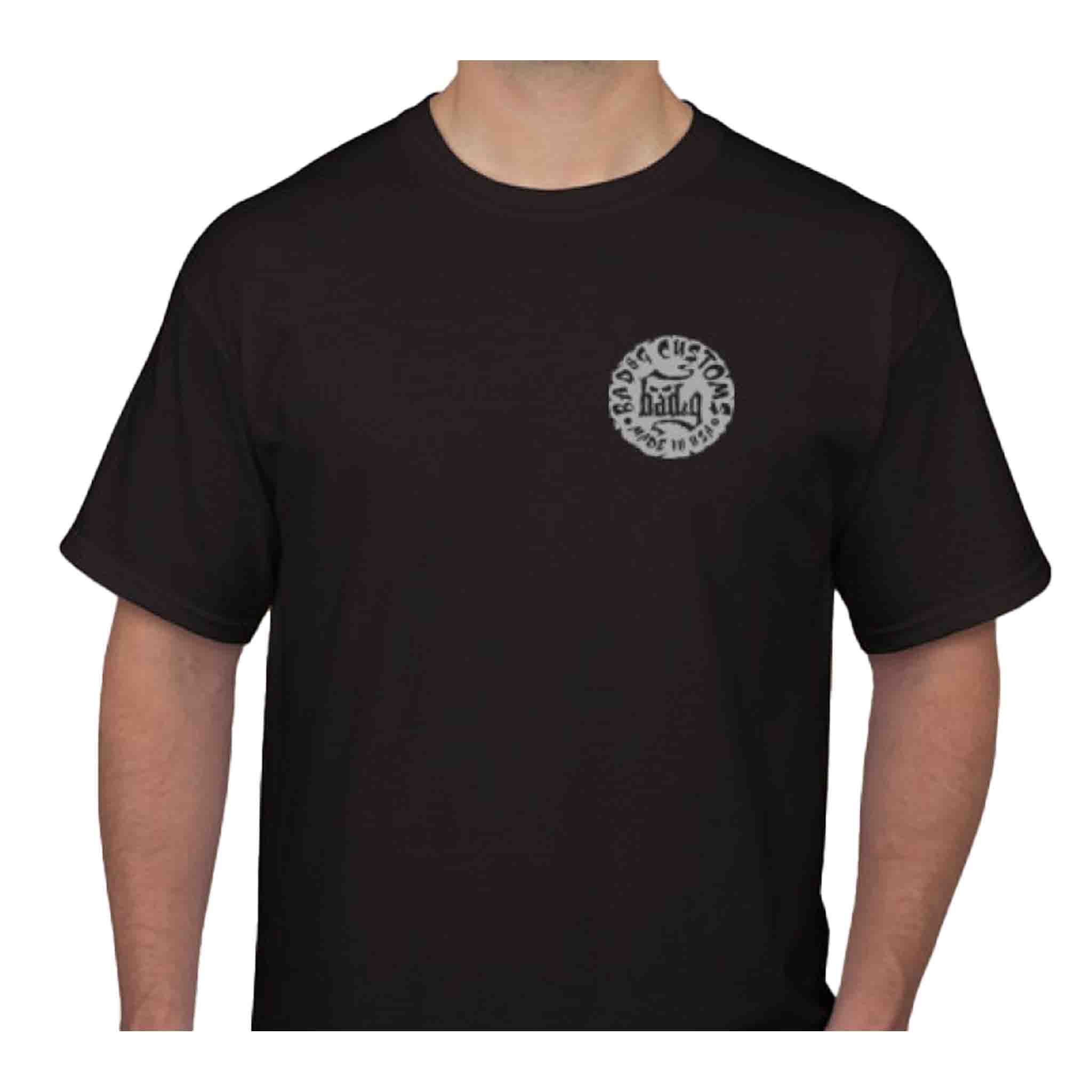 Introducing the BAD&G Shop Shirt – a must-have for any motorcycle enthusiast. Crafted from heavy, 100% cotton, this black Gildan t-shirt delivers a vintage look and feel. Featuring a clear, bold imprint on both the front and back, this shirt combines rugged style with ultimate comfort.