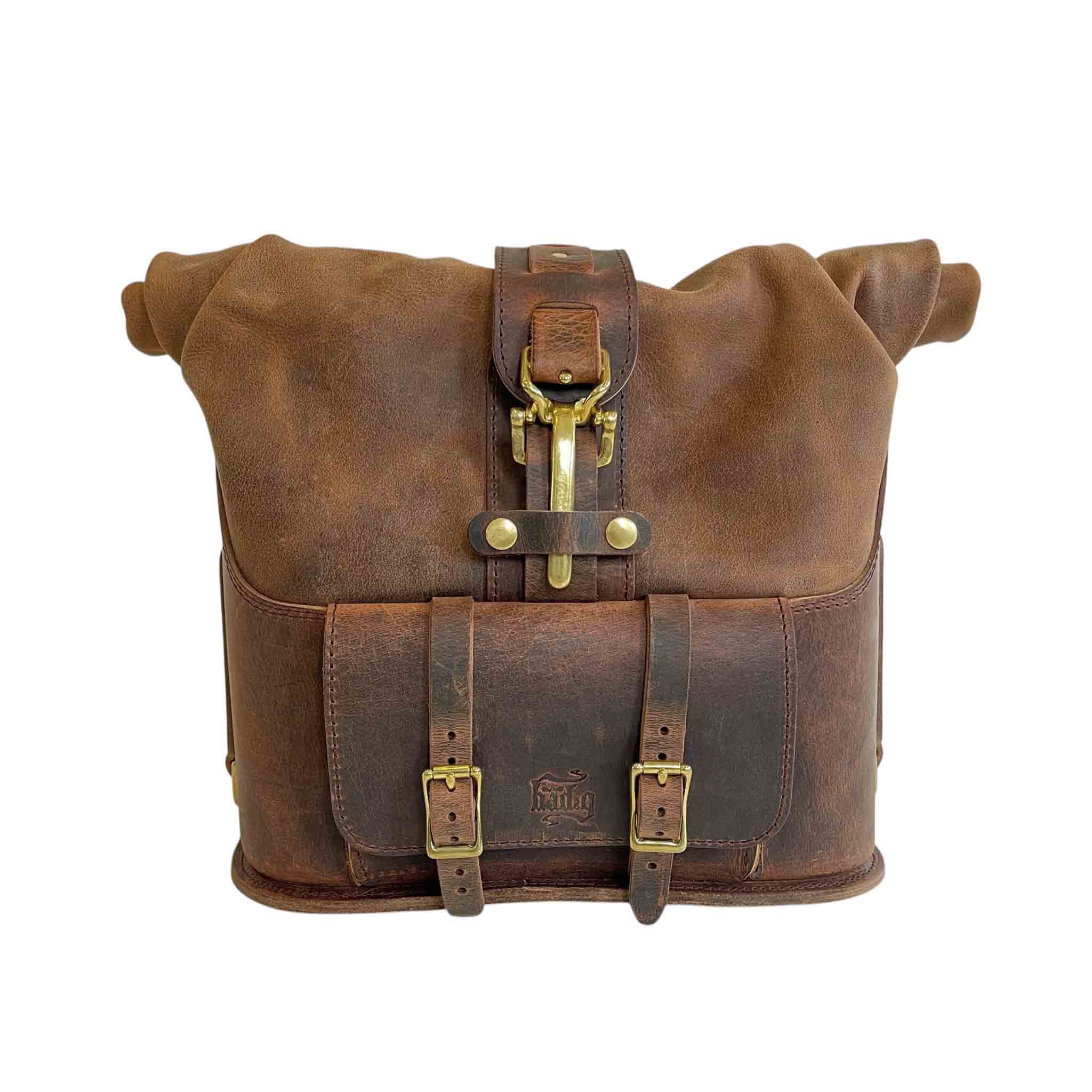 Triumph Bonneville Bobber Panniers Rolltop Swingarm Saddlebags. Hand crafted in USA with premium veg tan water buffalo leather, waterproof liners and solid brass hardware. BAD&G Customs TBP01